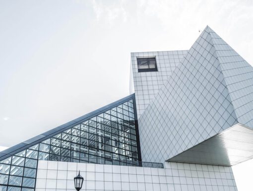 A building with a large triangle shaped window.